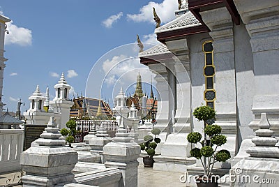 White ornate towers of Temple of the Emerald Buddha Wat Phra Kaew, Bangkok Stock Photo