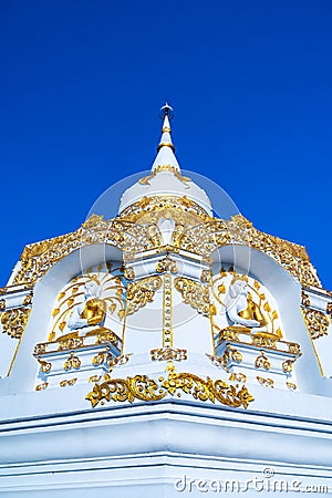 White pagoda with blue sky at Tham Phra Sabai temple Stock Photo
