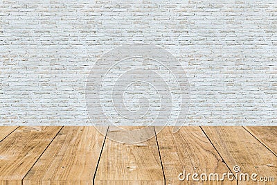 White paint brick wall with wooden table forground Stock Photo