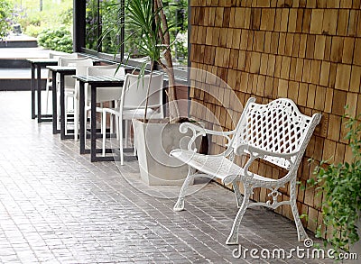 White painted outdoor metal iron bench vintage retro style Stock Photo