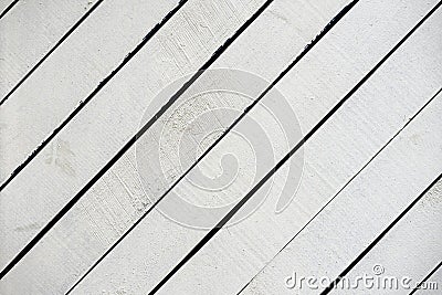 White painted wooden surface close-up. Rustic natural wooden diagonal planks with cracks, scratches for modern design Stock Photo