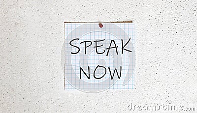 White paper on the white background with text Speak Now Stock Photo