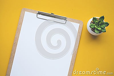 White paper notepad on pastel color backgrounds.Flat lay design. Stock Photo