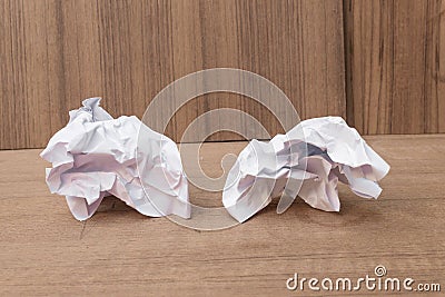 White paper sheet, paper Crumpled paper ball, on a wooden floor Stock Photo