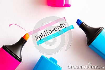 On a white paper written tag philosophy circled in different color markers in red and blue Stock Photo