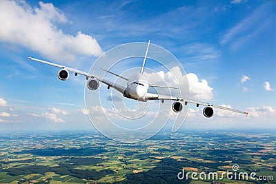 Modern double decker passenger aircraft in flight. Right inclination. Front view Stock Photo