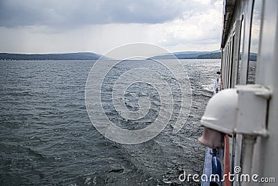 white passenger tourist ship floats on the water Stock Photo