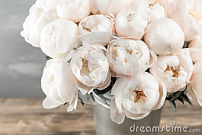 White peonies in vase. retro styled photo. close-up Stock Photo