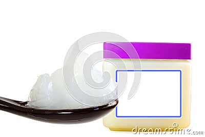 White petroleum jelly in spoon with jar in white background Stock Photo