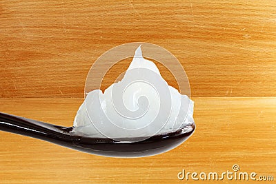 White petroleum jelly in spoon Stock Photo