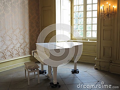 White piano in classy environment Stock Photo