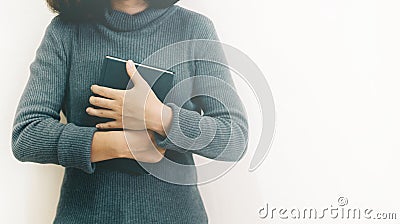 Women standing and hold bible. Stock Photo