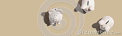 White piggy banks overhead view Stock Photo