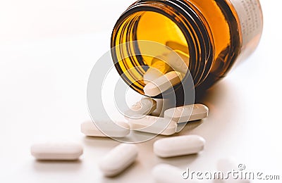 White pills in a bottle/painkiller/paracetamol 500. Stock Photo