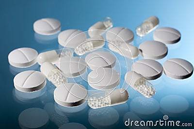 White pills and capsules Stock Photo