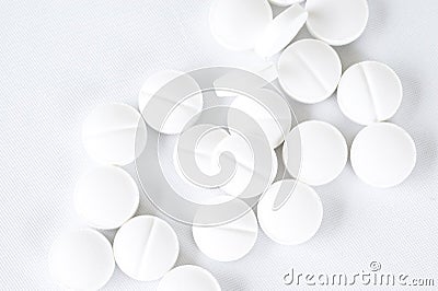 White pills on white Stock Photo