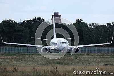 White plane in Berlin Tegel Airport, TXL Editorial Stock Photo