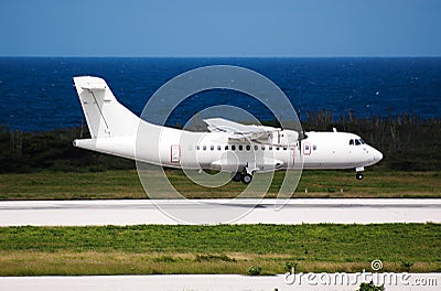 White plane landing Stock Photo