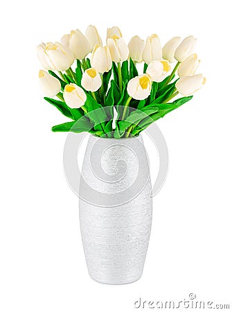 White plastic artificial tulips with green leaves in silver vase isolated on white background. Tulip flower decoration Stock Photo