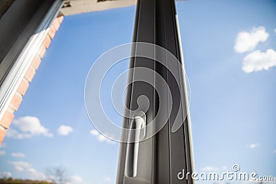 White plastic double glazing window and bright blue sky background Stock Photo
