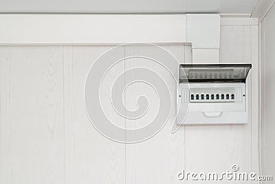 White plastic electric guard on a white wall Stock Photo