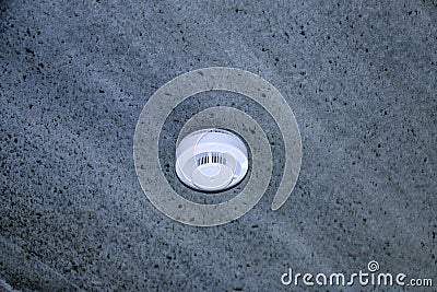 White plastic smoke detector for home and office, for fire alarm Editorial Stock Photo