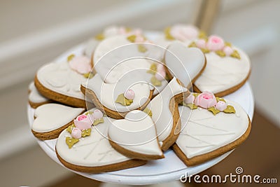 White plate with gingerbread cookies in white glaze Stock Photo