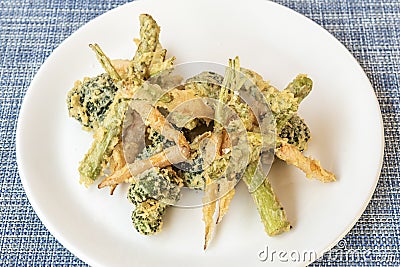 White plate with Japanese-style tempura vegetables Stock Photo