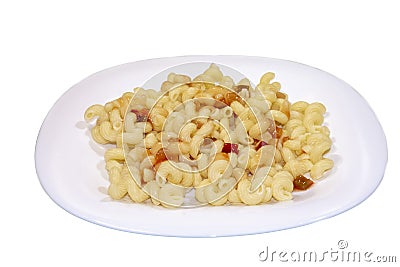 A white plate of macaroni with ketchup. Isolated on white background with clipping path. Close-up Stock Photo
