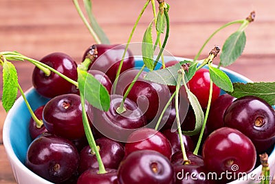 White plate of ripe cherries Stock Photo