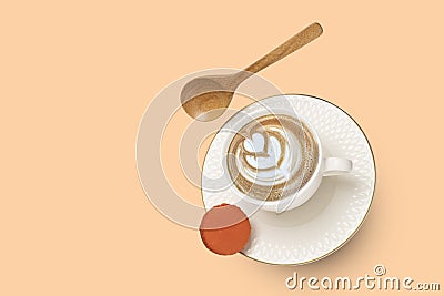A white porcelain cup with cappuccino coffee and a gold rimmed saucer with an orange macaroon Stock Photo