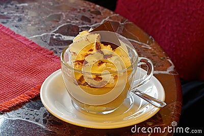 White porcelain Cup with gourmet coffee and ice cream on marble table in Italian bar. Stock Photo