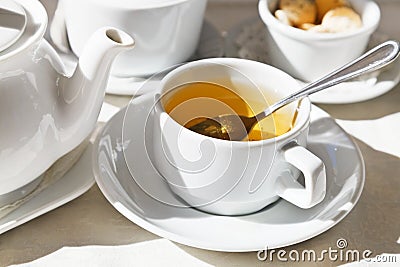 White porcelain cup with herbal tea Stock Photo