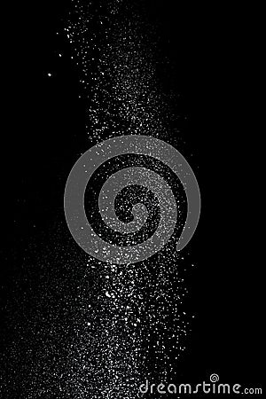 White powder splash isolated on black background. Flour sifting on a black background. Explosive powder white flour Stock Photo