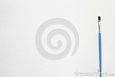 white primed canvas and brush for painting, blank for creativity, art background Stock Photo