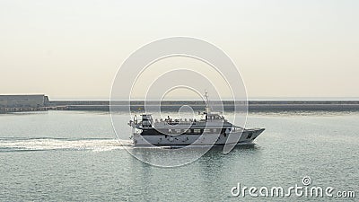 Private yacht leaving the port of Barcelona Editorial Stock Photo