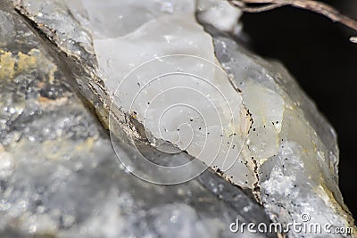 White quartz rock full of details and cracks Stock Photo