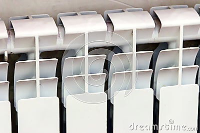 White radiator. Close up elements modern battery - source of heat Stock Photo