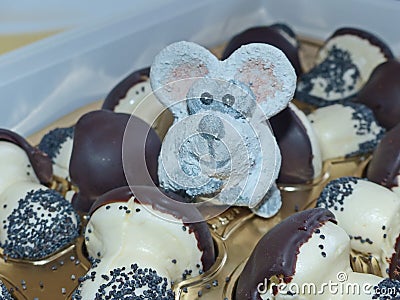 White rat and chocolate mushrooms candy. A treat for small and adult sweet tooth. According to the Eastern calendar Stock Photo