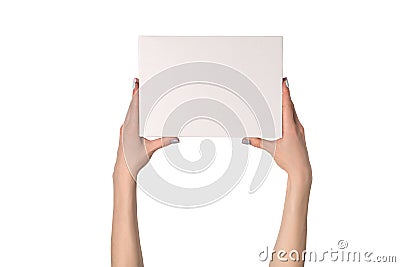 White rectangular box in female hands. Top view. Isolate Stock Photo