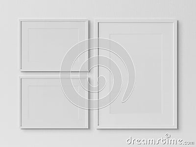 White rectangular frames hanging on a white wall mockup 3D rendering Stock Photo
