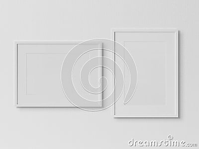 White rectangular frames hanging on a white wall mockup 3D rendering Stock Photo