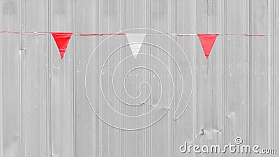 White and red triangle flag is hanging Stock Photo