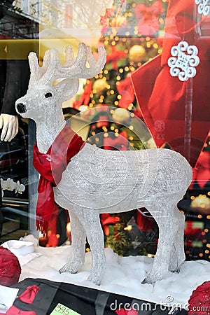 White Reindeer in Store Window Stock Photo