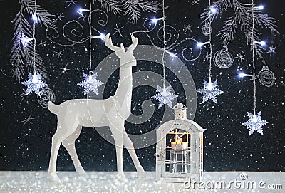 White reindeer on wooden table over chalkboard background whith hand drawn chalk illustrations Cartoon Illustration