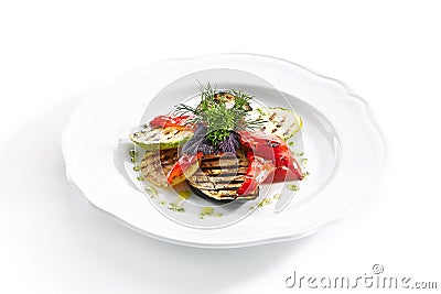 White Restaurant Plate of Grilled Vegetables and Fresh Greens Isolated Stock Photo