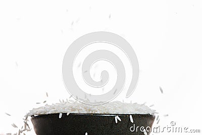 White Rice falling down. Jasmine Rice, Thai Rice, Raw Rice. Stock Photo