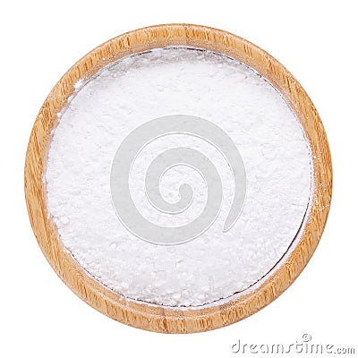 White rice flour powder in wooden bowl isolated on white. Top view Stock Photo