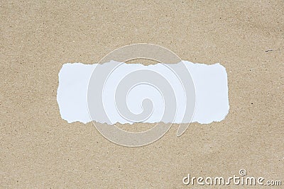 White ripped piece of paper on brown document texture paper Stock Photo