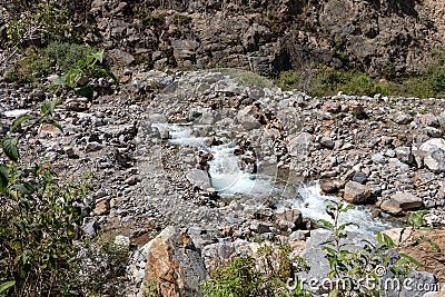 White river or Rio Blanco Valley with fast running water between the stones, Peru Stock Photo